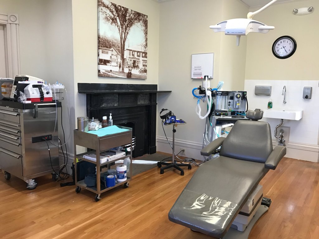 Photo: New England Oral Surgery & Associates surgical suite and patient chair