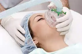 The patient is receiving anesthesia for her surgery